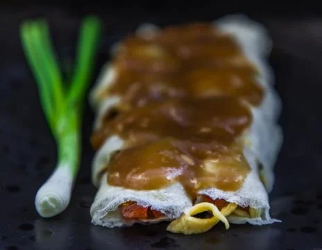Close-up of Thai fresh spring rolls Topped with Sweet sauce. Stock Photos