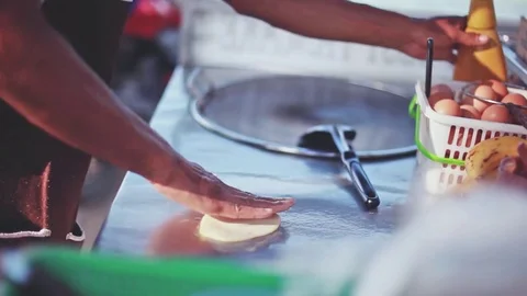 Close up of thai hands making pancake on the street of Samui by the beach Stock Footage 82221738