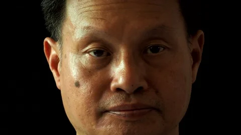 Close up Thai man with black background, in studio Chiangmai  Thailand. Stock Footage 200443131