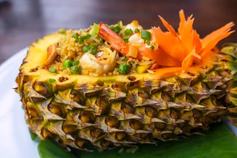 Close up Thai royal pineapple fried rice. Fried rice with shrimps served in a Stock Photos