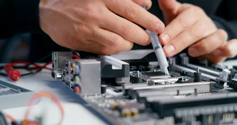 Close up of Thermal Paste Application on CPU Micro Processor in PC Motherboard Vidéo 159808989