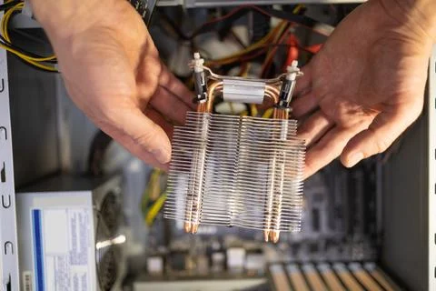 Close-up of thermal paste on the CPU cooling system. CPU cooling system 库存照片