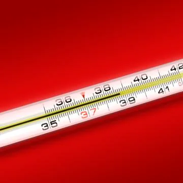 Close-up thermometer on red background Fotos de archivo