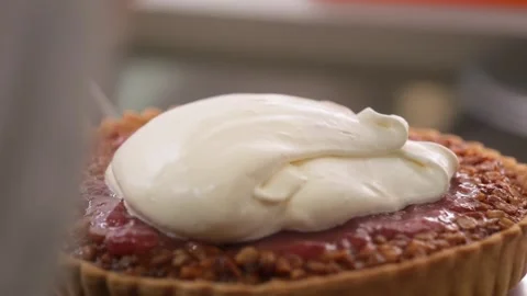 Close-up of Thick Cream Topped on a Fresh Strawberry or Raspberry Fruit Tart, Go Stock Footage 337751470