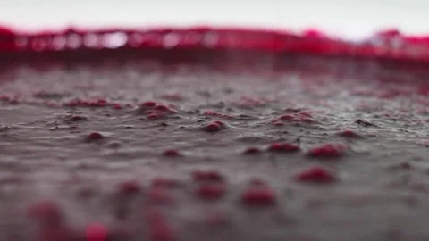 Close up of Thick Dark Berry Smoothie Texture and Bubbles in a Transparent Cup Stock Footage 339630158