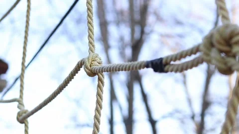 Close-up of thick light-colored ropes tied into a knot Stock-Footage 331502239