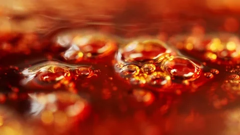 Close-up of thick red liquid bubbling and boiling. Stock Footage 133203987