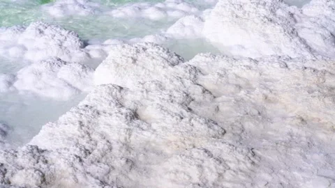 Close up of thick white salt layers in a natural salt mine deposit Video stock 342326355