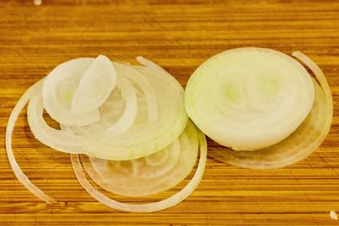 Close up of thinly sliced ??onion to be used on a hamburger Stock Photos