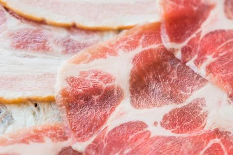 Close up of thinly sliced raw marbled pork belly Stock Photos