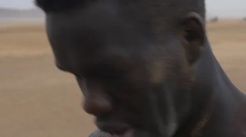 Close-up of thirsty and worn-out black guy Video stock 67558683
