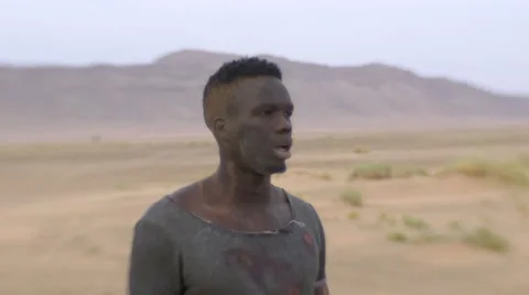 Close-Up Of Thirsty And Worn-Out Black Guy 03 Video stock 67558996