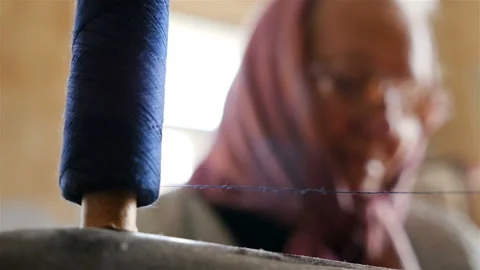 Close-up of a thread with threads on a sewing machine. Sewing of clothes. Slow Stock Footage 89088604