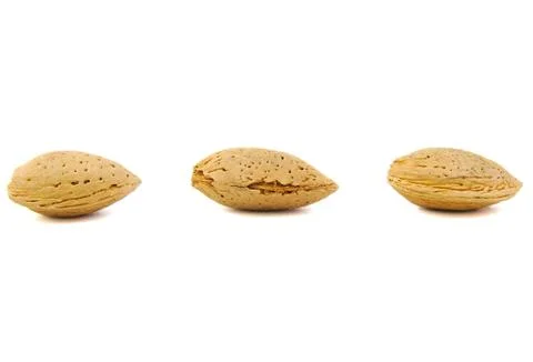 Close up of three almonds Stock Photos