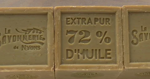 Close-up of three bars of natural, handmade Marseille soap. Stock Footage 327453337