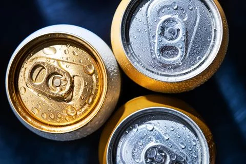 Close-up of three beer cans Stock Photos