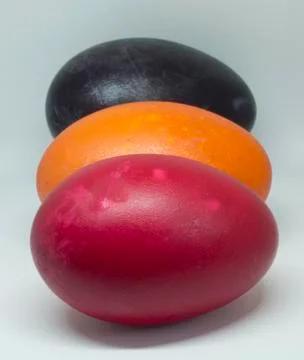 Close up of three colored duck eggs. Stock Photos