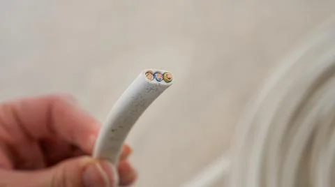 Close up of an three-core electrical cable Stock Photos