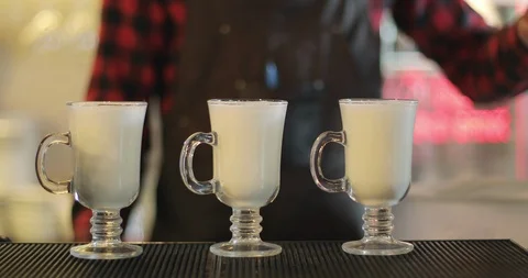 Close-up of three cups of cappuccino or latte. Stock Footage 94365332
