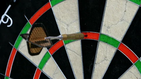 Close up of three darts hitting triple twenty on a dart board, 4K Stock Footage 46595411