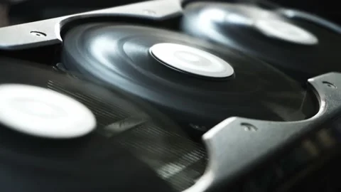Close-up of three fans of a graphics card spinning mining cryptocurrencies Stockbeeldmateriaal 167244950