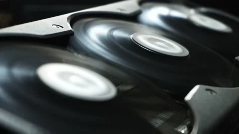 Close-up of three fans of a graphics card spinning mining cryptocurrencies Video stock 167244980