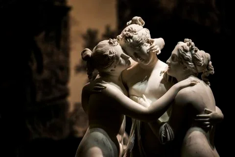 Close-up of The Three Graces, a statue of the three daughters of Zeus, embracing Stock Photos