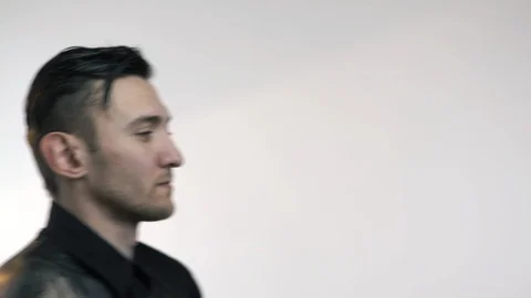 Close-up, Three Guys in Improvised Shirts Pass Through Friend in Funny Goose Stock Footage 86259642