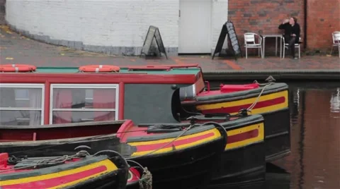 Close Up of Three Narrow Boat Barges Lined in a Row Stock-Footage 44524812