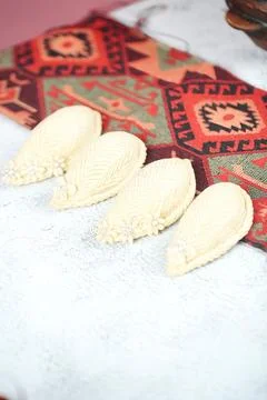 Close-Up of Three Pieces of Bread on a Rug Stock Photos