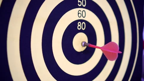 Close up of three red darts hitting the center of the target. Selective focus. Stock Footage 132291737