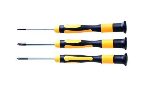 Close-up of three screwdrivers with different heads on a white background Stock Photos