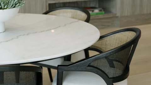 Close up of three stylish chairs with white seats and translucent backs standing Stock Footage 265201513