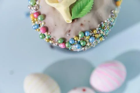 Close-up of three white Easter eggs with a pattern in the form of hearts and Stock Photos
