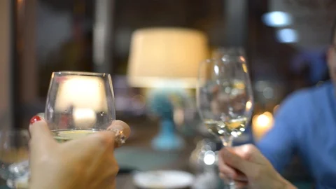 Close Up Of Three Wine Glasses Being Toasted At the Restaurant Dinner Video stock 98537786