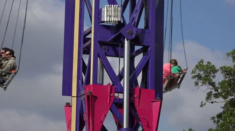 Close Up Thrilling Sky High Spinning Carnival Ride Video stock 48830016