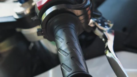 Close-up of the throttle handle and brake lever of a sport motorbike Stock Footage 283295583