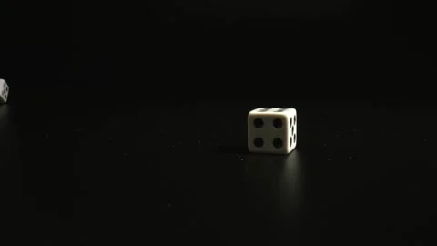 Close up of throwing dices on black background in casino. Gambling addiction Stock Footage 144340184
