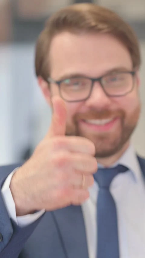 Close Up of Thumbs Up by Businessman Video stock 321106553