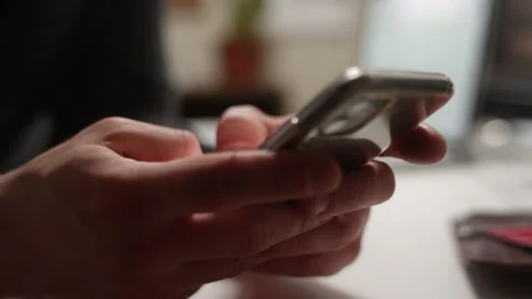 Close up of thumbs texting on a smartphone with shallow focus 스톡 동영상 134272363