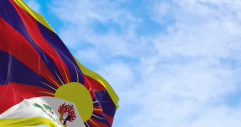 Close-up of Tiber flag waving in in the wind on a clear day. Chinese autono.. Stock Footage 293779198