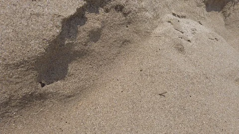 Close up tidal waves hitting fine sand mediterranean shore Stock Footage 122072498