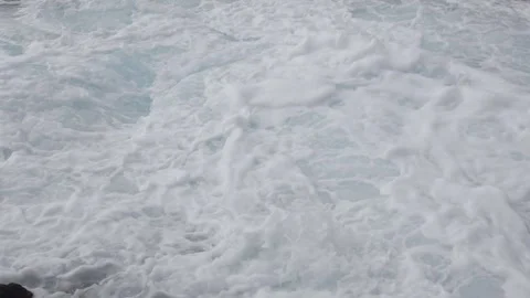 Close up of the tide rising and falling ... | Stock Video | Pond5