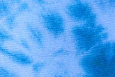 Close up tie dye fabric pattern. Hand made texture. Stock Photos