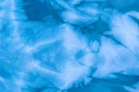 Close up tie dye fabric pattern. Hand made texture. Stock Photos
