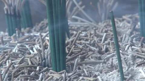 Close up tile on burning incense sticks in Buddhist temple, Okubo-ji Stock Footage 86758869