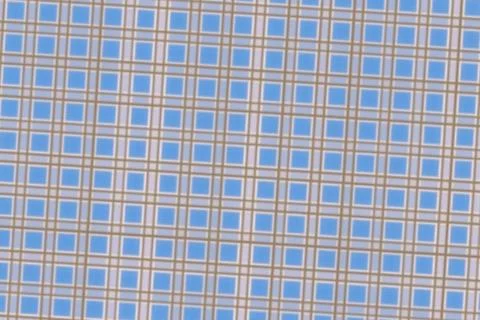 Close-up of a tiled wall with small blue and gray squares Stock Photos