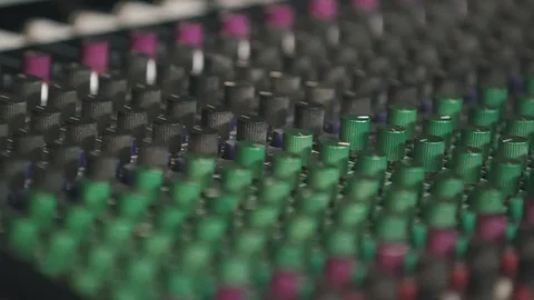 Close Up Tilt Up and Down of Audio Board Knobs Stock Footage 89511410