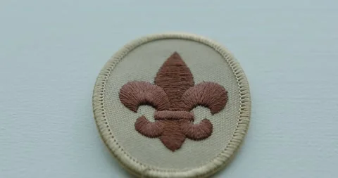 Close Up Tilt Down of a Boy Scout Arm Patch Stock Footage 165220643
