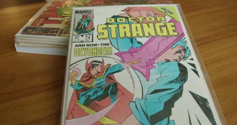 Close Up Tilt Down of a Doctor Strange Comic Book on a Table Stock Footage 232111870